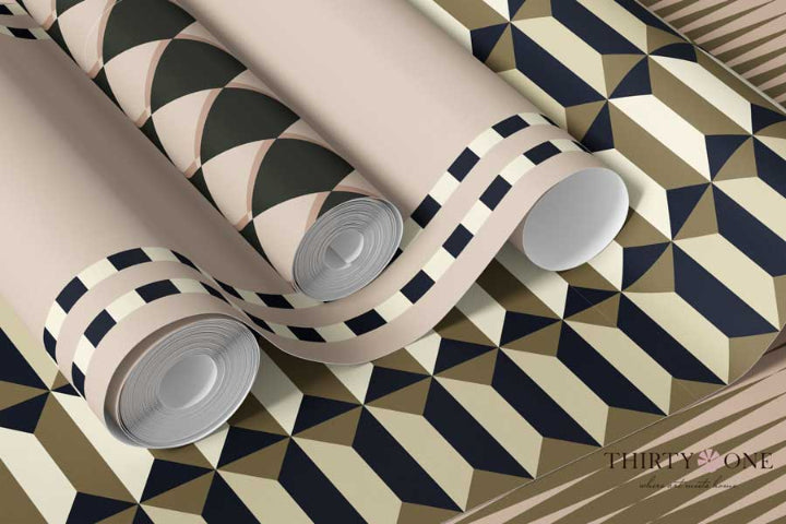 Rolls of geometric-patterned wallpaper on a matching surface with 'THIRTY ONE' branding.